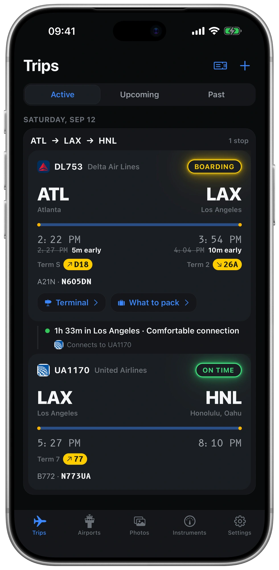 A linked trip from Atlanta through Los Angeles to Honolulu on Delta DL753 and United UA1170, with a 1 hour 33 minute layover marked as a comfortable connection. Captured example in night mode.