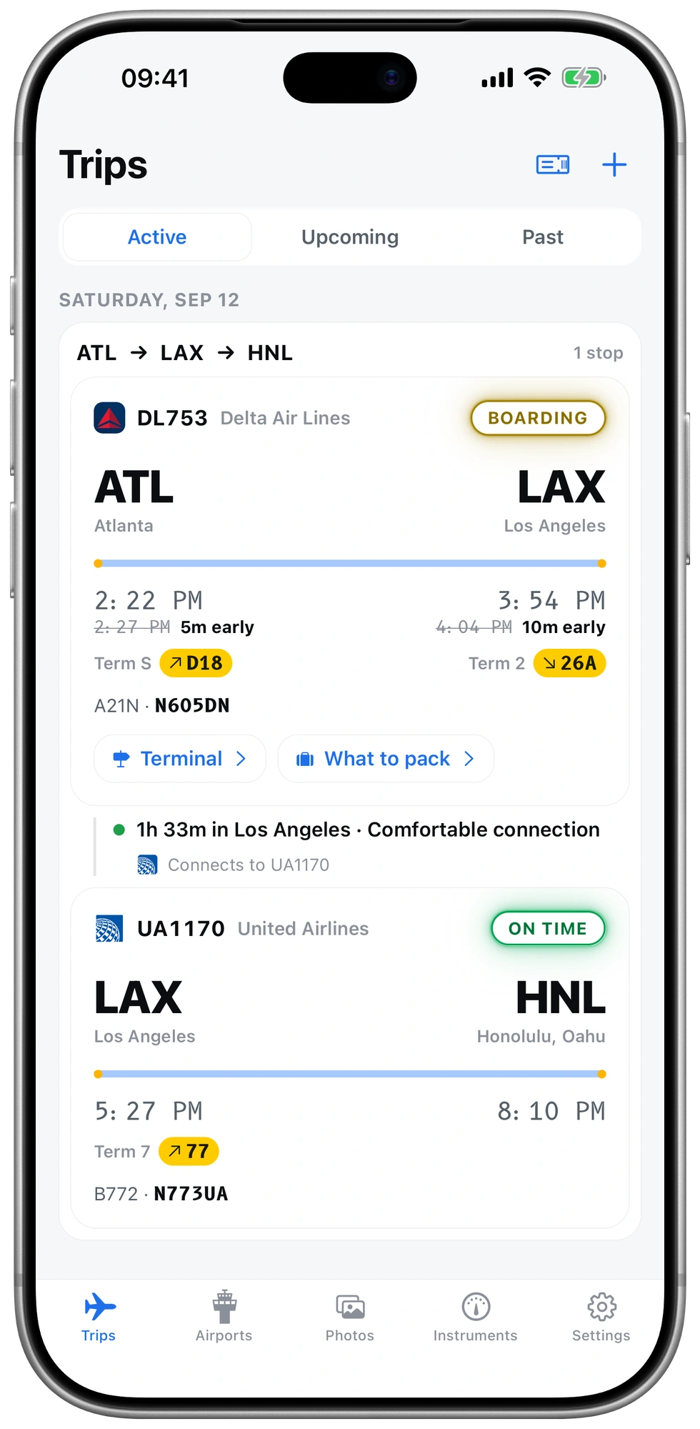 A linked trip from Atlanta through Los Angeles to Honolulu on Delta DL753 and United UA1170, with a 1 hour 33 minute layover marked as a comfortable connection. Captured example in day mode.