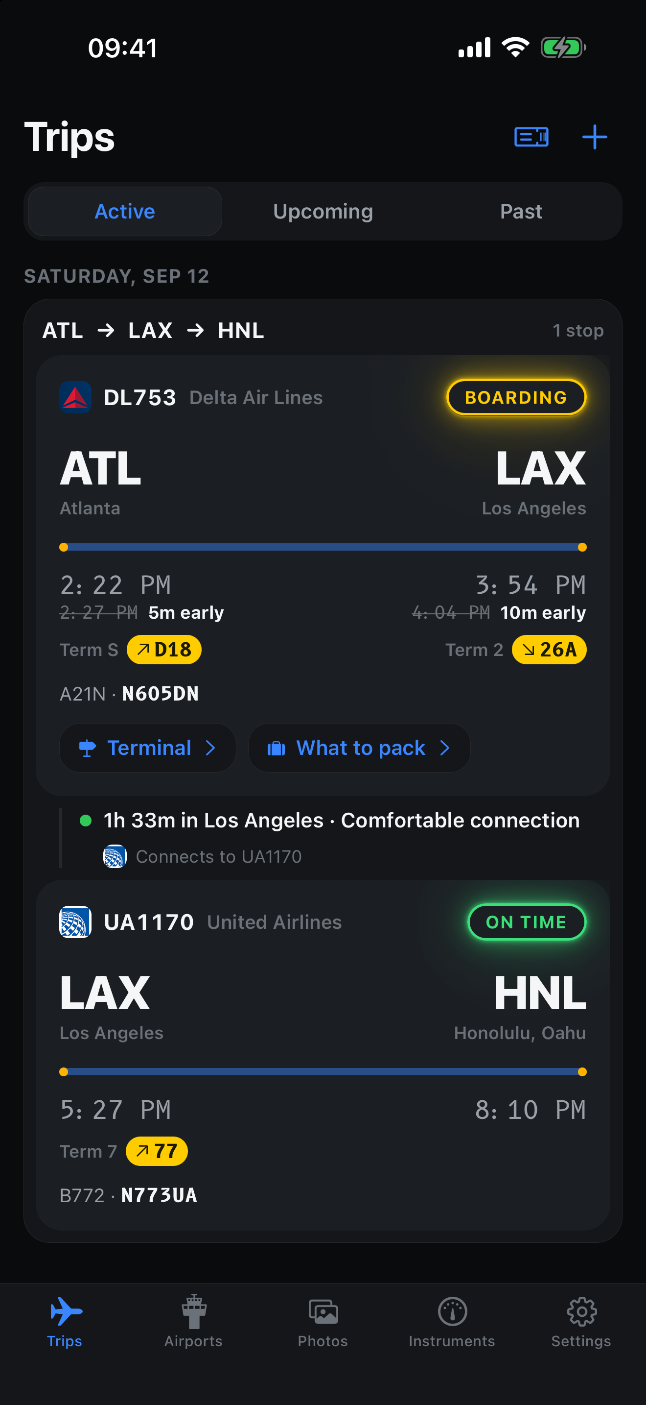 A linked trip from Atlanta through Los Angeles to Honolulu on Delta DL753 and United UA1170, with a 1 hour 33 minute layover marked as a comfortable connection. Captured example in night mode.